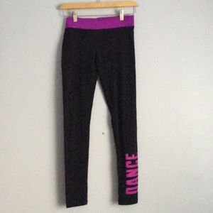 Justice Black leggings with magenta lettering